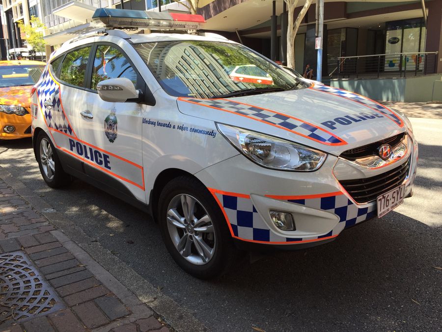 A Queensland Police Service Hyundai ix35 patrol car parked in central Brisbane, illustrative of a QPS response in the Logan region.